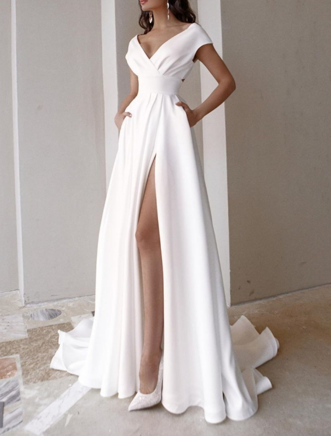 Cover image for Wedding dress cover-ups for winter: a ceremony-to-reception plan